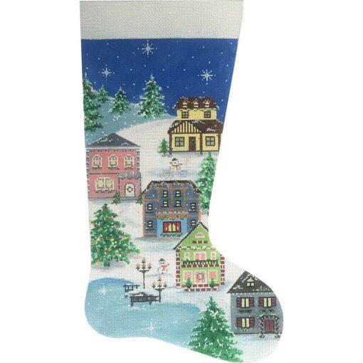 Winter village printed Christmas stocking with blue, green houses and snowy scene