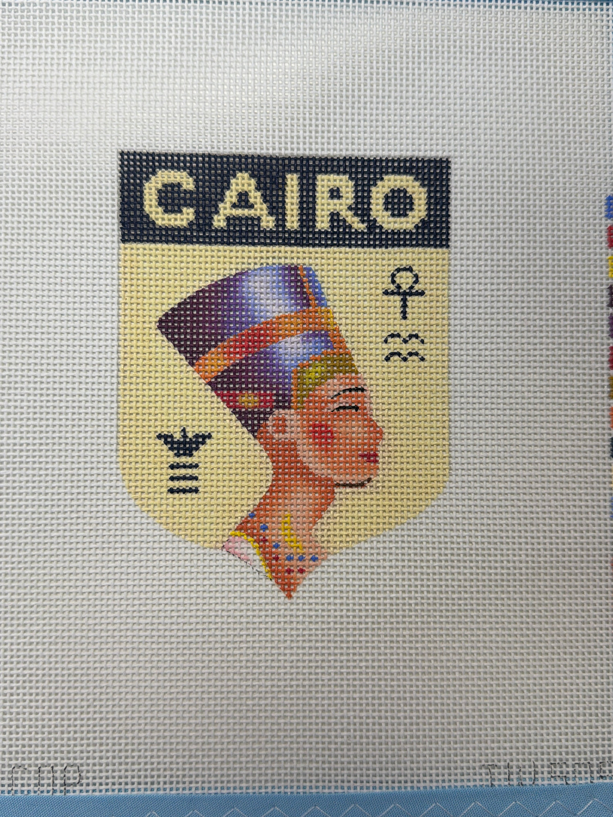 Cairo graphic T-shirt with front text and face icon print