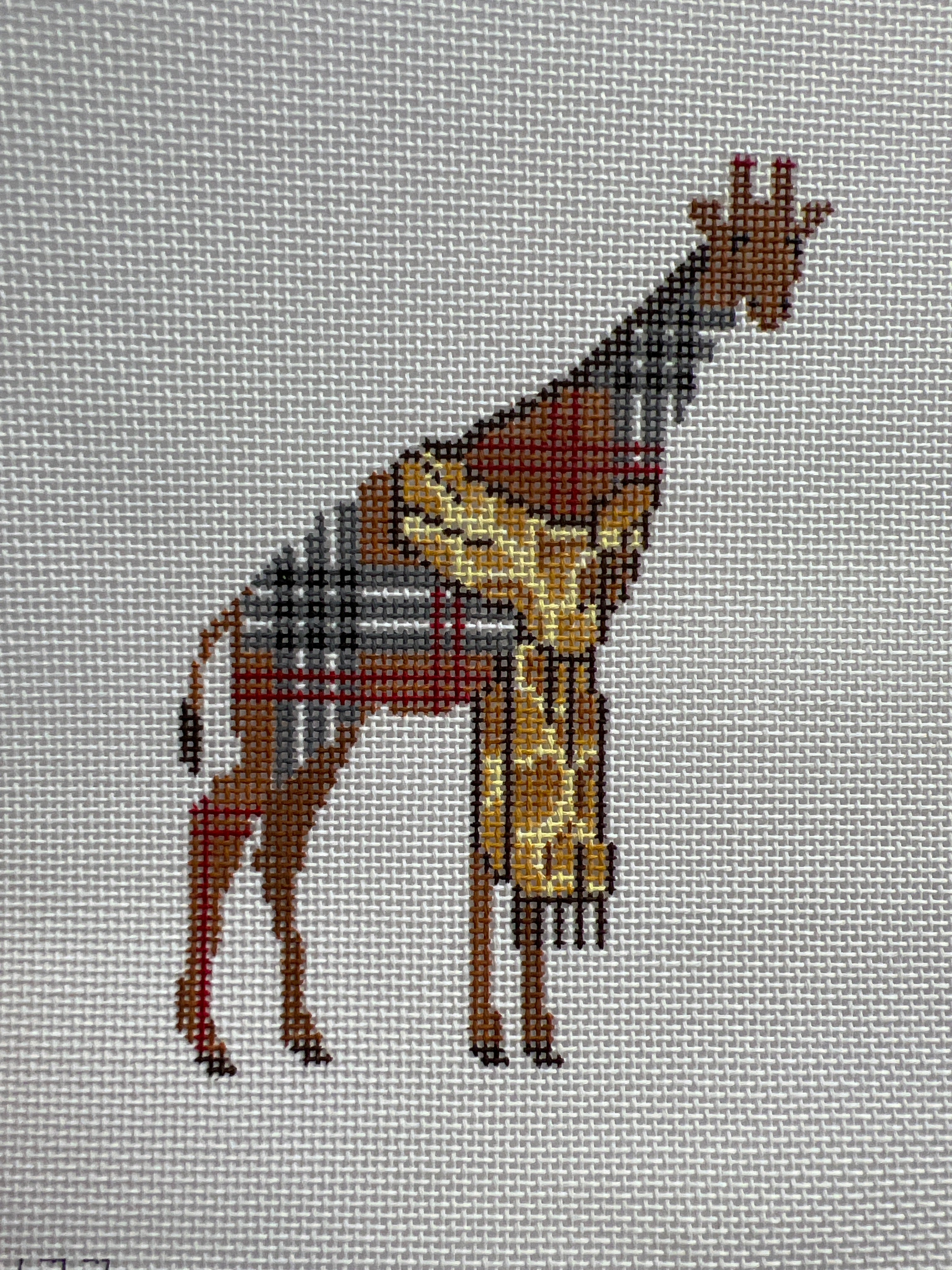 Plaid Giraffe in spotted scarf