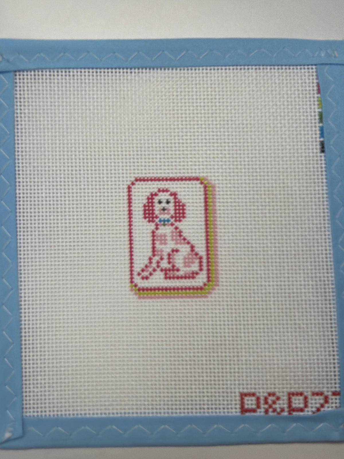 Mini mahjong tile with joker character icon, red and gray center