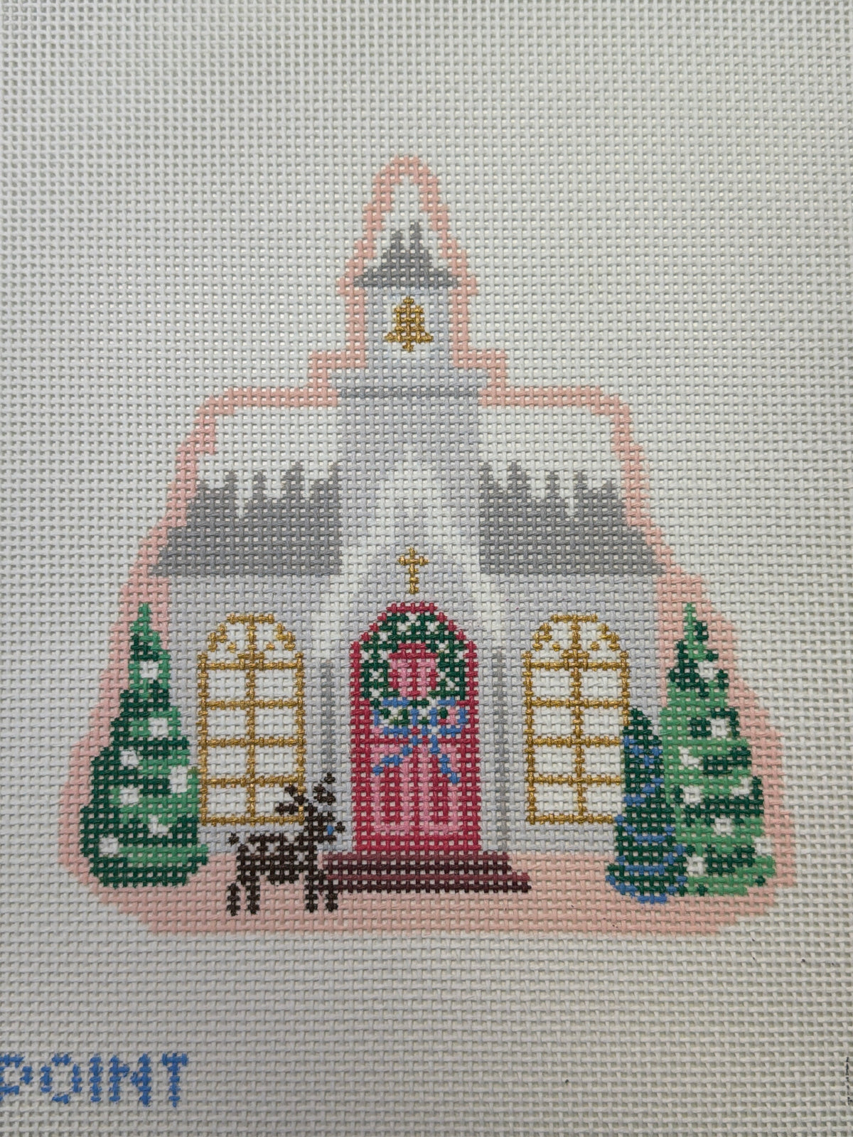Embroidered village church wall art with red door, arched windows, two pine trees