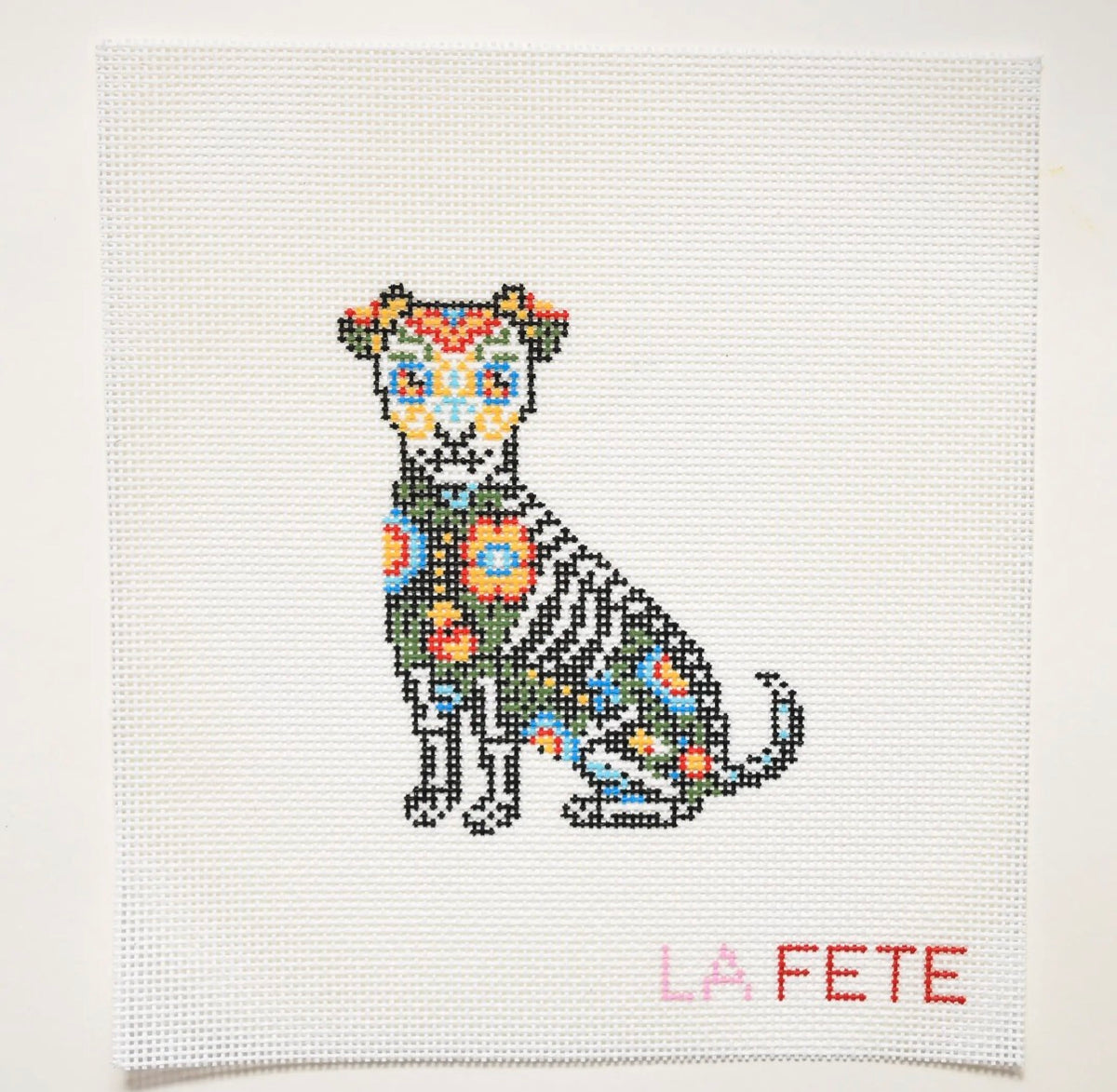 Embroidered multicolor dog motif square with decorative flower on chest