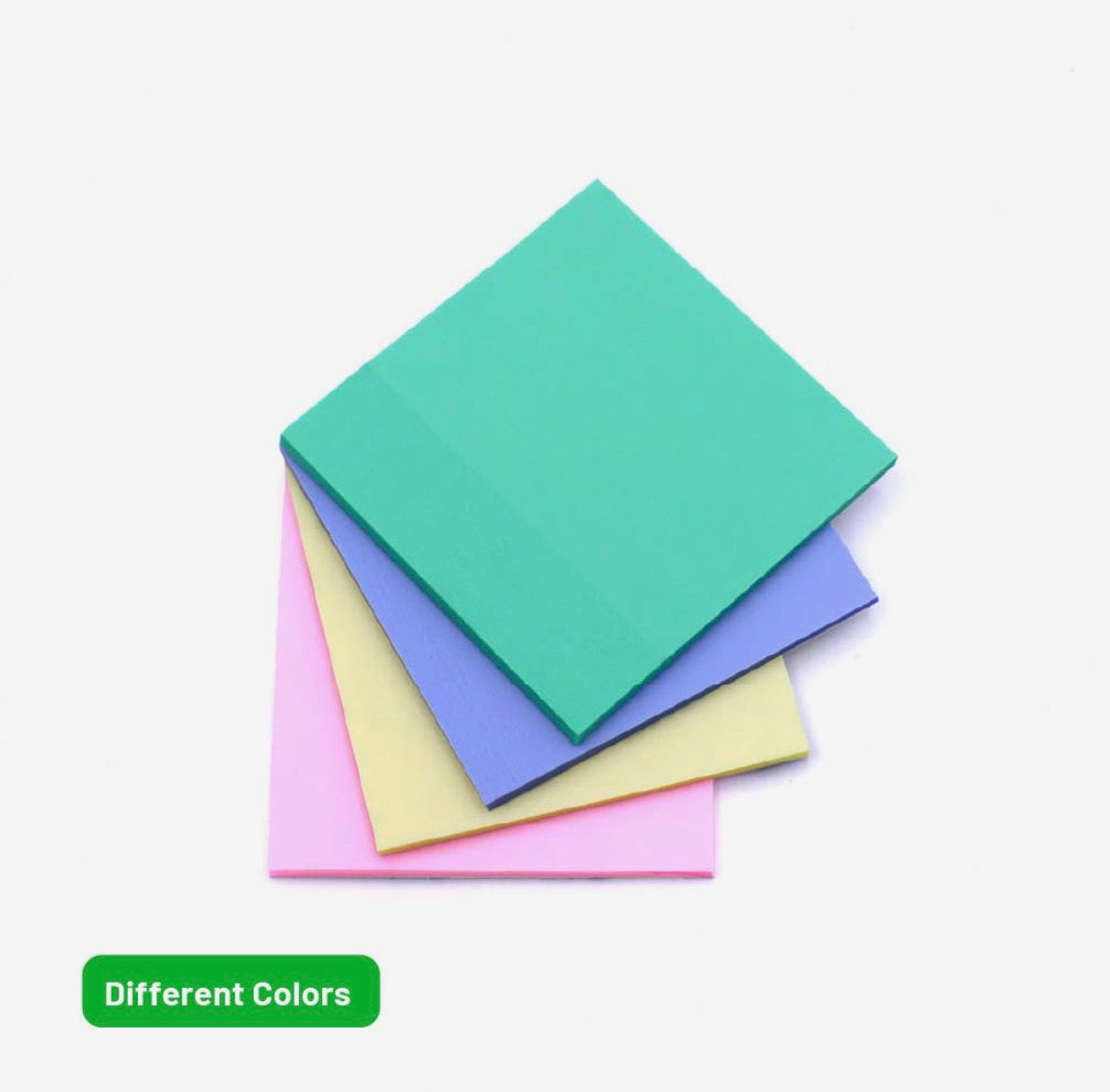 Stack of square sticky notes in green, blue, yellow, and pink