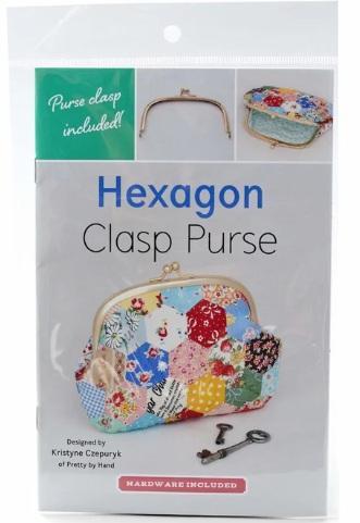Hexagon clasp purse with colorful floral patchwork fabric and metal frame clasp