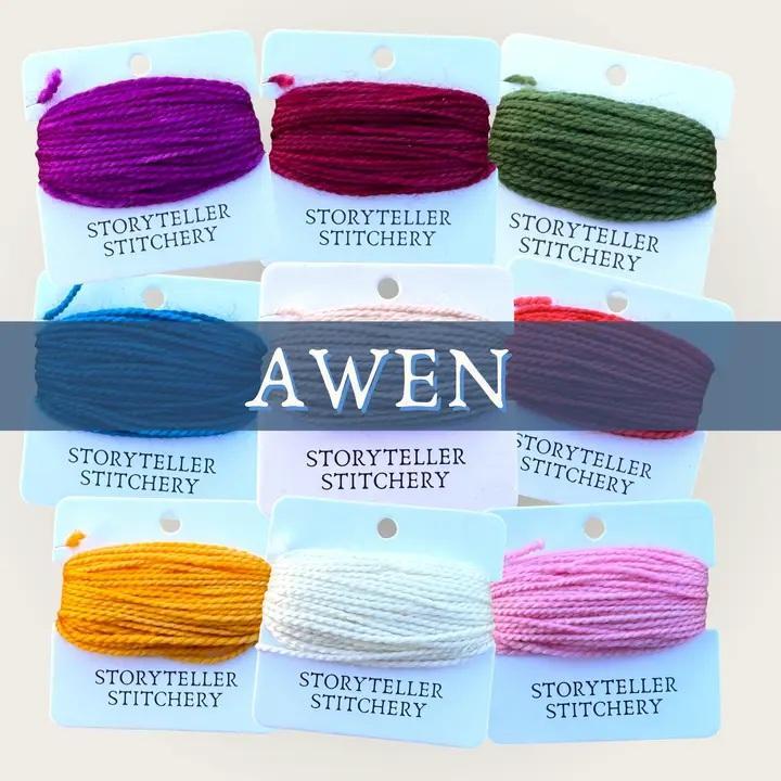 Hand-dyed embroidery threads set on cards, showing multiple spool colors.