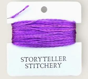 Hand-dyed embroidery thread skein on card, vibrant purple with heathered texture