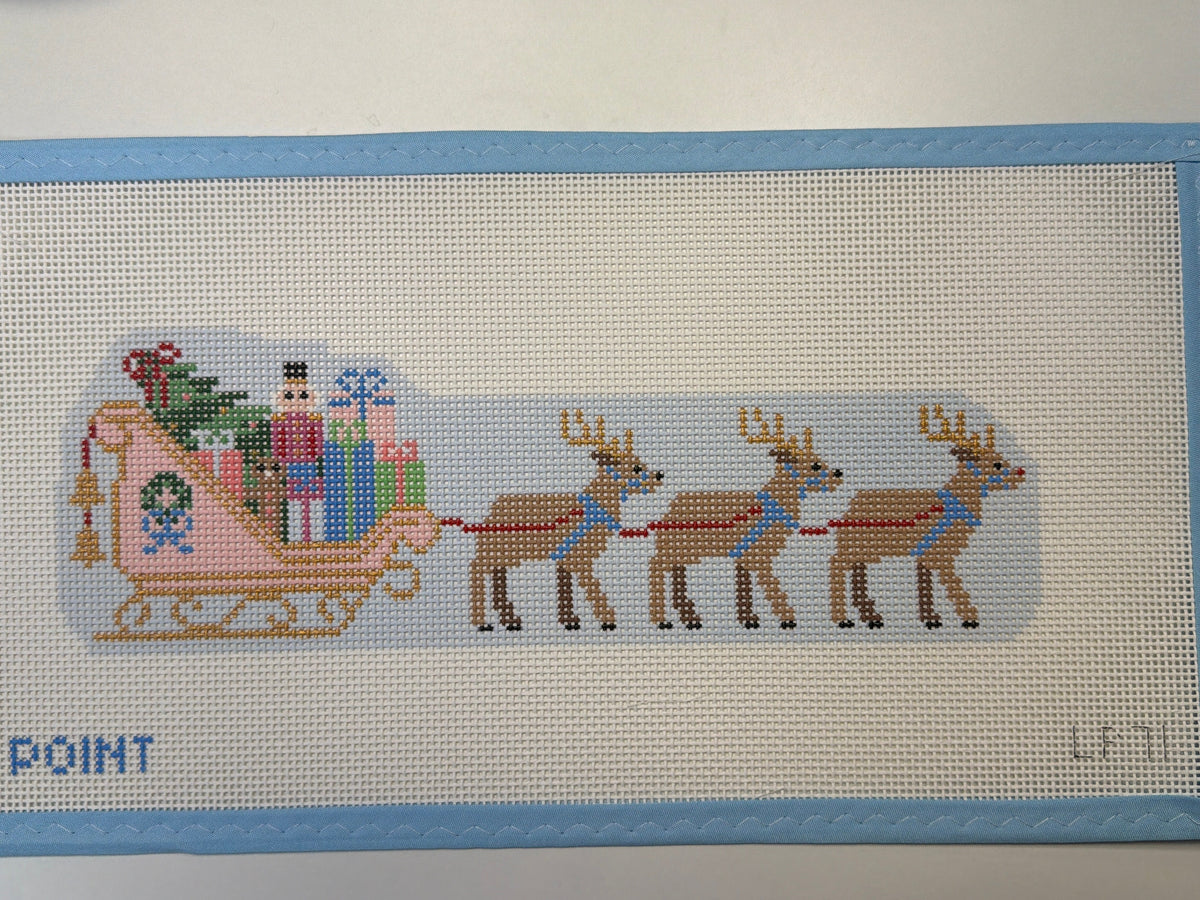 Beige cross-stitch mesh with colorful Santa sleigh motif