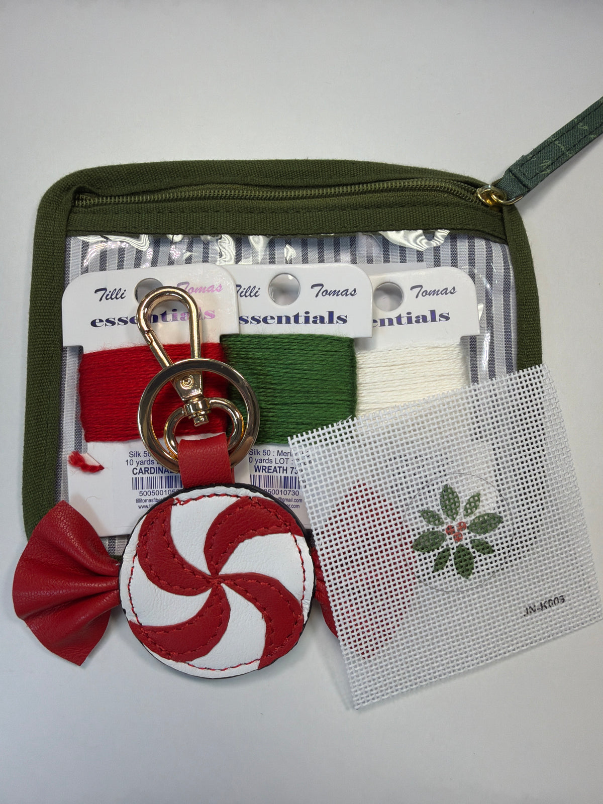 Olive bag charm kit pouch with peppermint-themed keyring charm and mesh charm pieces