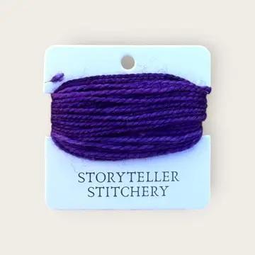Hand-dyed yarn thread spool, rich purple on a hanging card