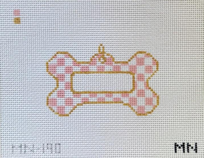 Bone-shaped dog tag canvas in pink check with gold trim outline