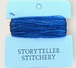 Hand-dyed embroidery thread skein on card, vivid blue with fine heathered pattern