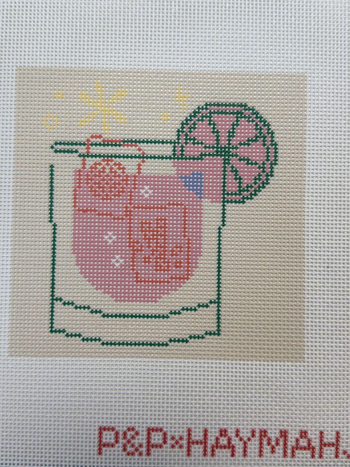 Square cocktail coaster with red drink cup illustration and green border