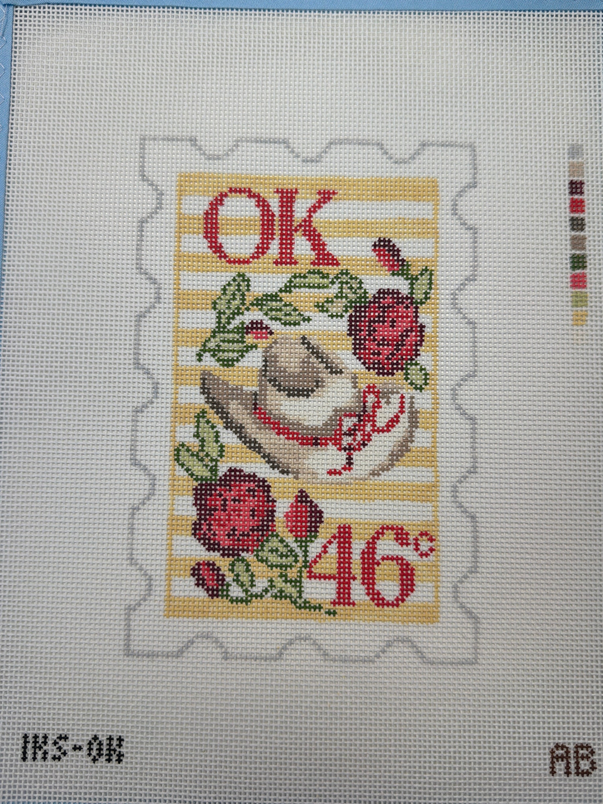 Oklahoma stamp with OK lettering, floral border, and red 40 on patterned square