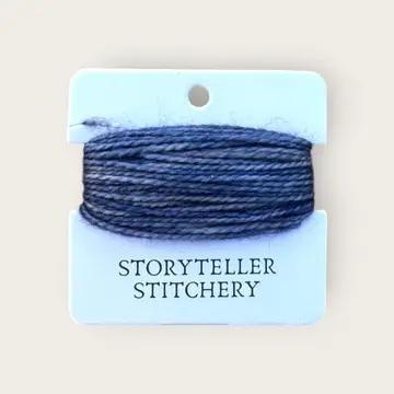 Hand-dyed yarn thread spool, indigo blue on a hanging card