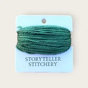 Hand-dyed yarn thread spool, green on a hanging card
