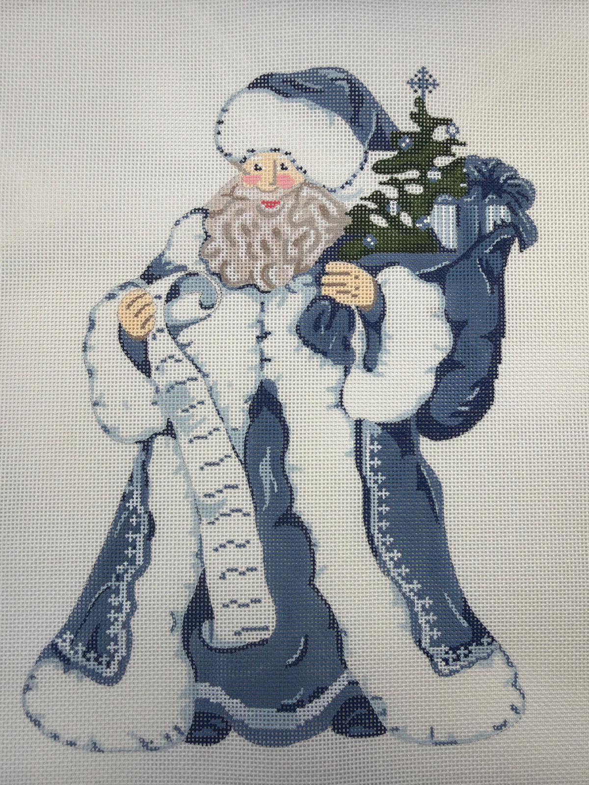 Wedgewood Santa figurine in blue and white holding a decorated Christmas tree