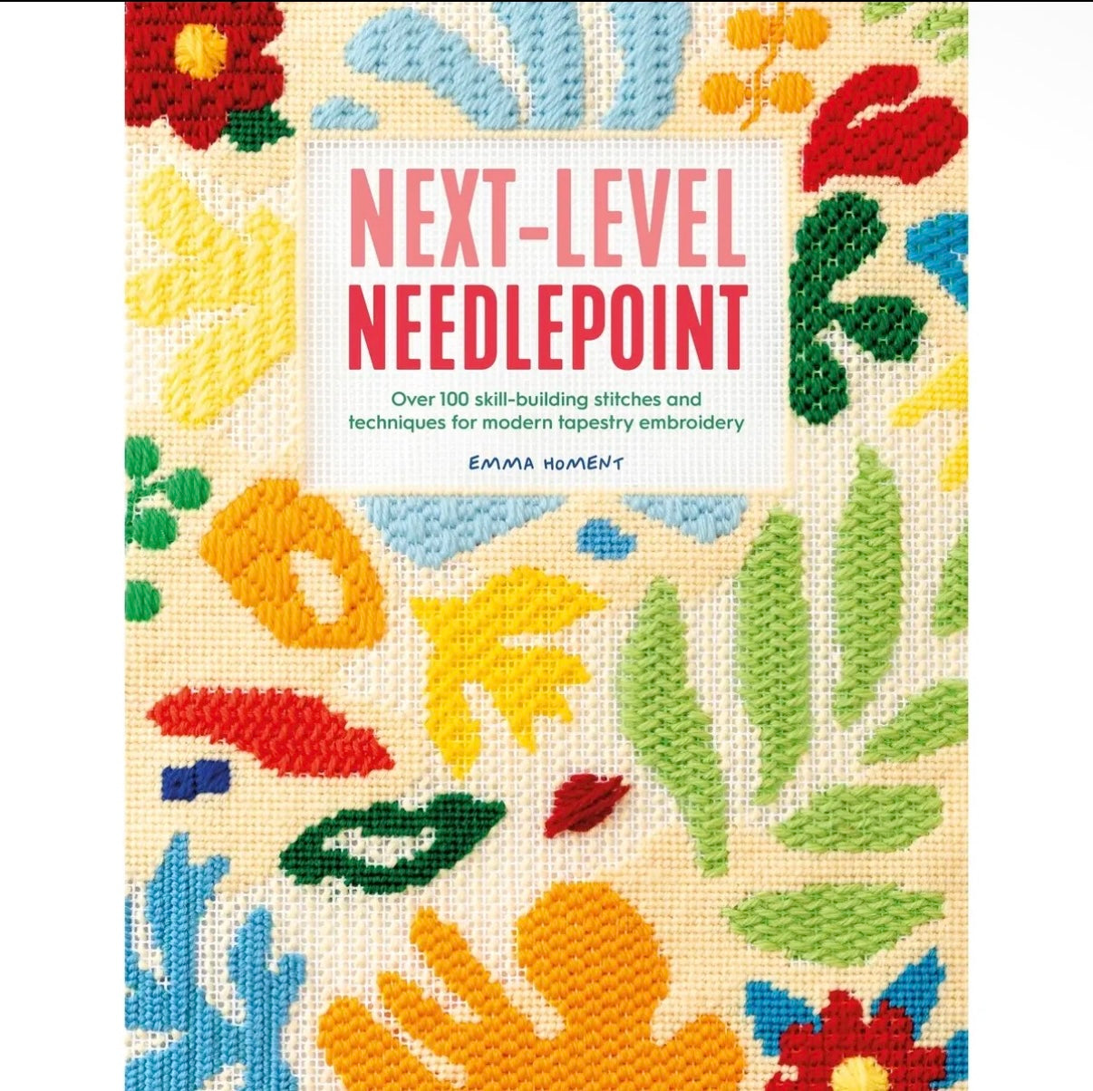 Needlepoint card deck cover with bold title and multicolor needlepoint pattern