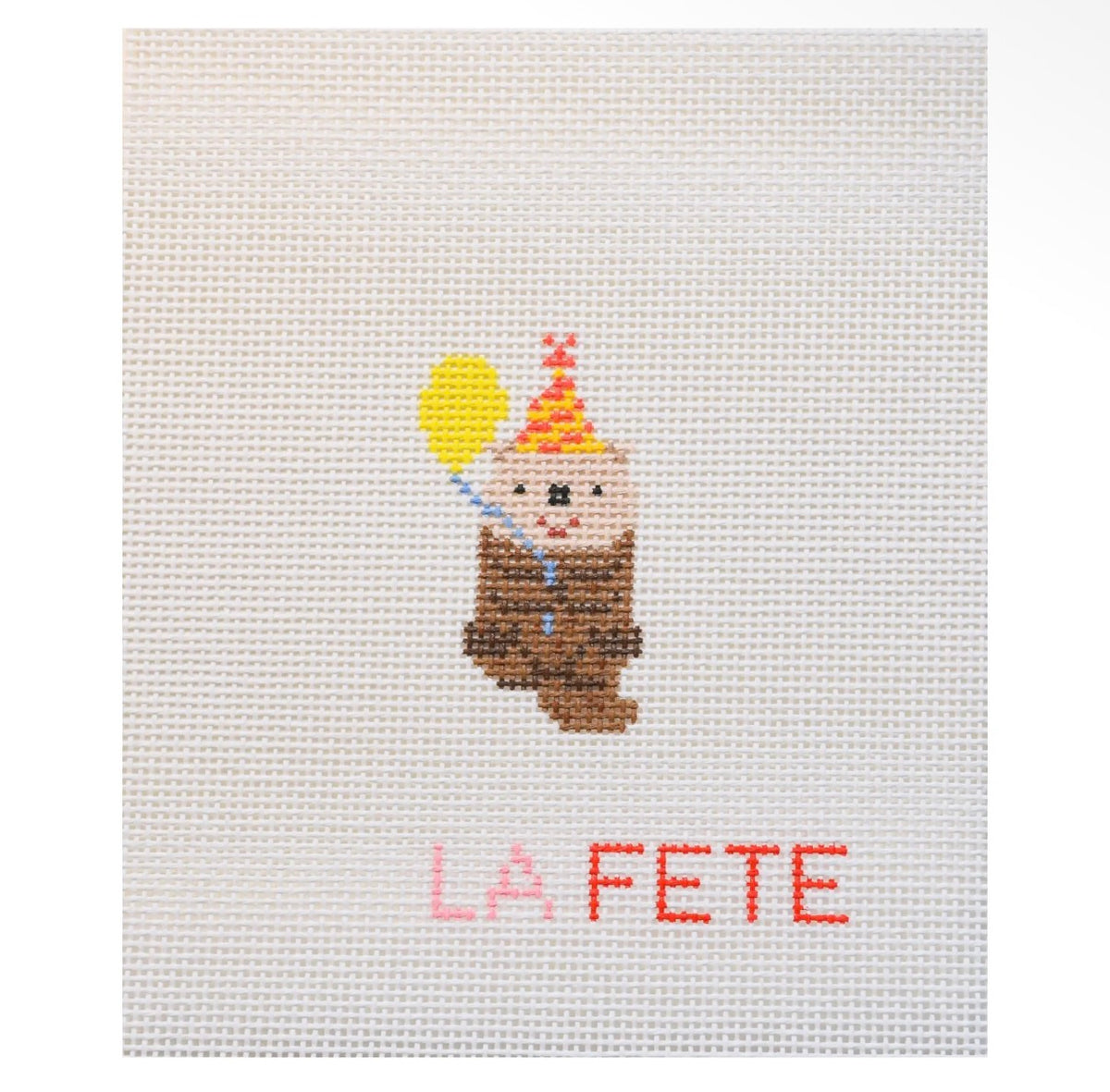 Embroidered party animal patch with yellow head and La FETE text