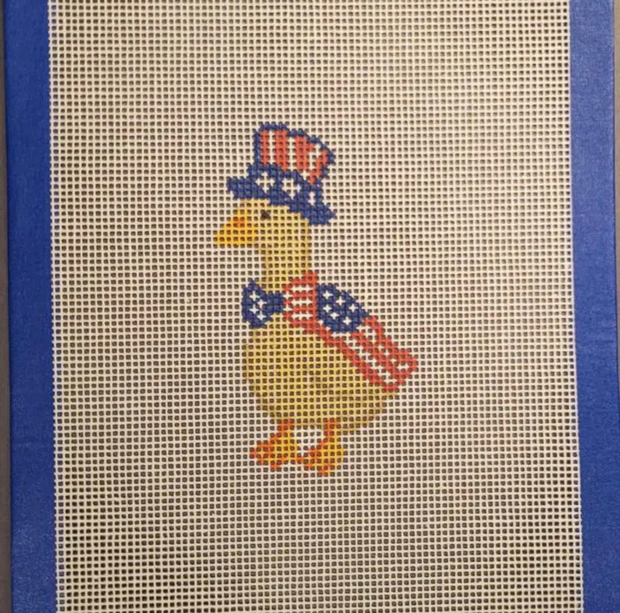 Embroidered patriotic goose design on beige fabric with stars and stripes