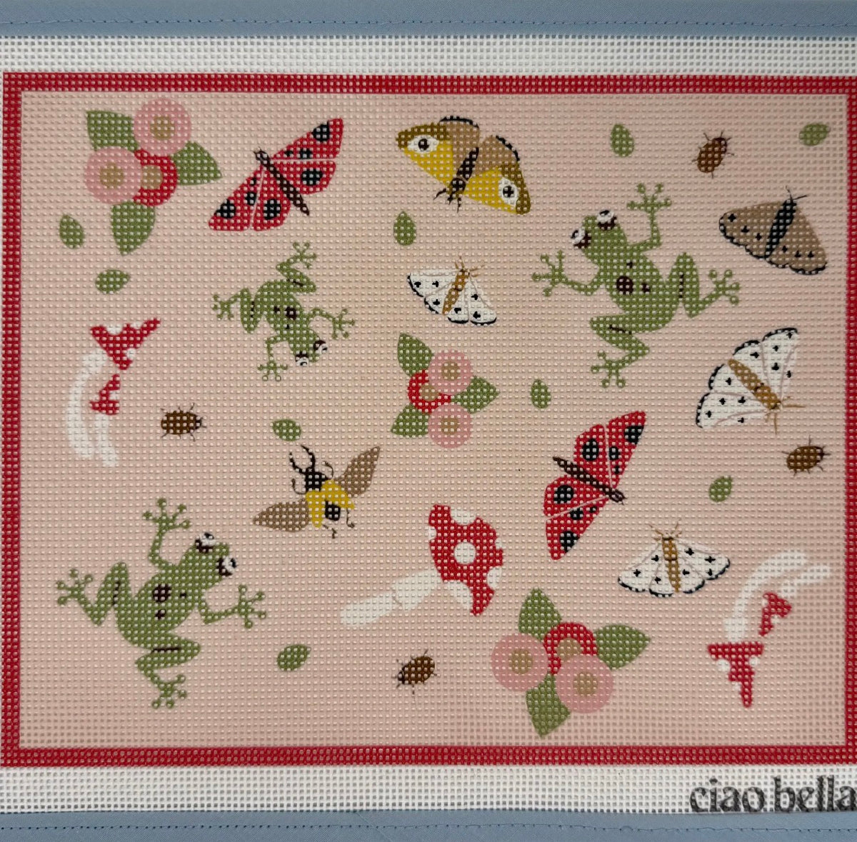 Decorative canvas wall art with red border, woodland insects and butterflies pattern