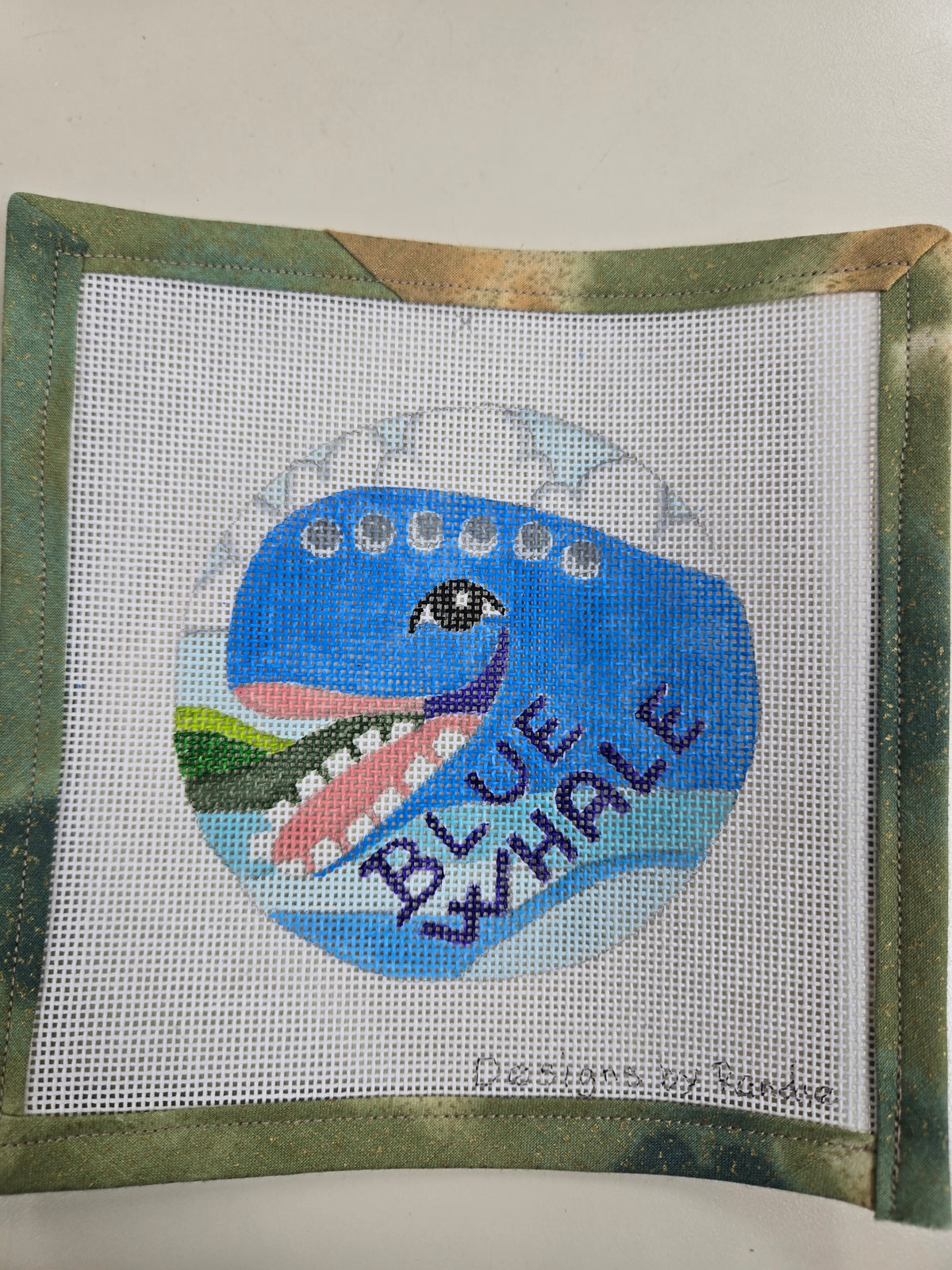 Blue Whale needlepoint square with a blue whale and aquatic scene