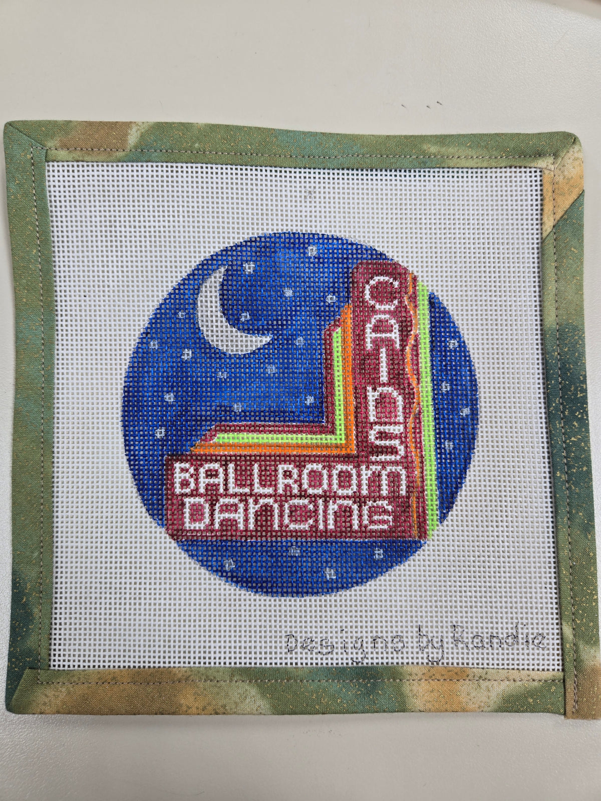 Cain's Ballroom needlepoint square with a blue moon and red neon sign design