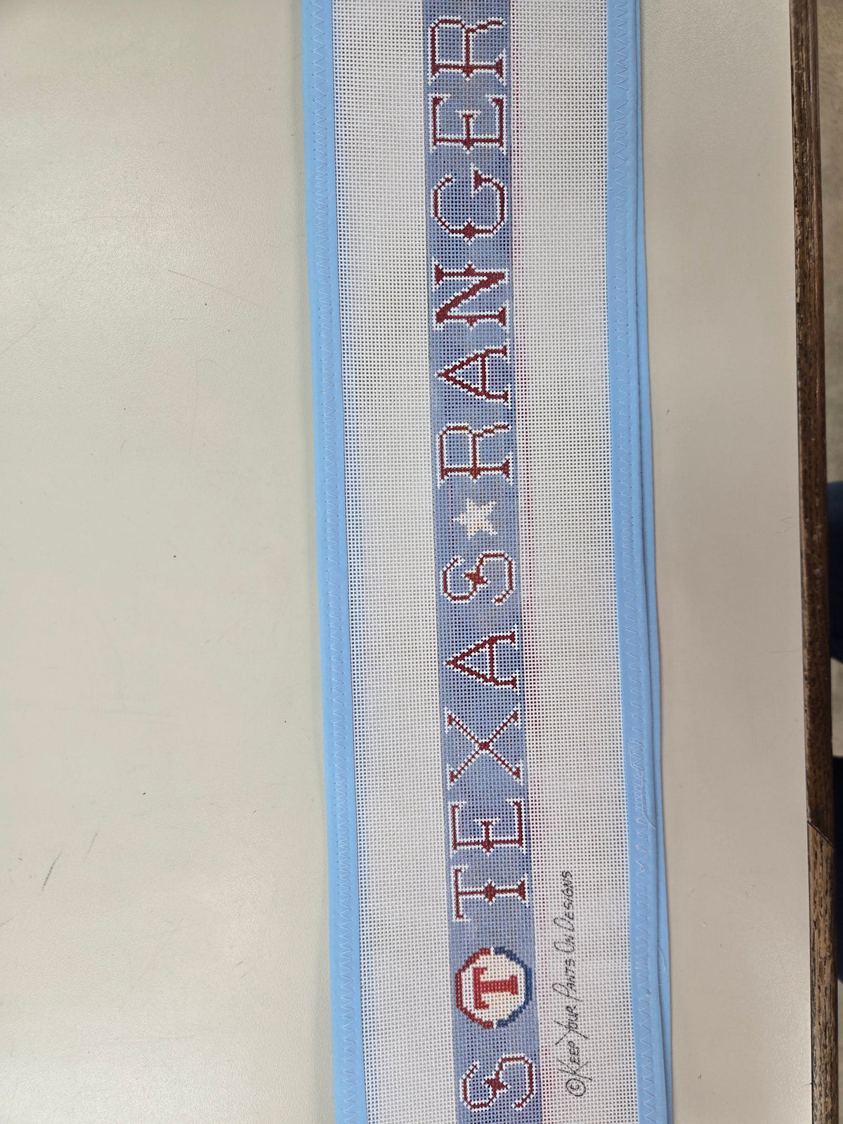 Belt strap with embroidered Texas Rangers text and logo