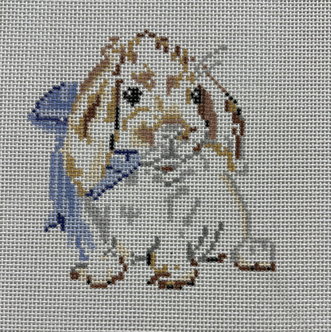 Cross-stitch bunny with blue bow